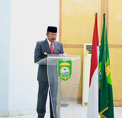Bupati Madina, H. Saipullah Nasution saat menyampaikan nota pengantar Ranperda) pada rapat paripurna DPRD, Senin (15/9/2025). Foto: Diskominfo