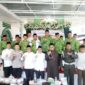 Sekda Madina Afrizal Nasution bersama Kepala Diskominfo Muhammada Syail Lubis menghadiri pelantikan Dewan Masjid Indonesia (DMI) periode 2026-2031 di Masjid Raya Panyabungan Al-Qurro' Wal Huffazh pada Sabtu. (istimewa)