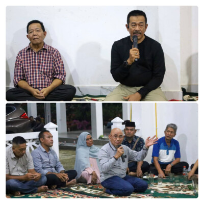 Bupati Mandailing Natal H. Saipullah Nasution (kanan atas) didampingi mantan Bupati Madina periode 2015-2020 Dahlan Hasan Nasution memberikan sambutan saat bersilaturahmi dengan masyarakat Natal di penginapan Melati Syariah, Minggu (6/9/2026). Tampak warga duduk lesehan menyimak penyampaian dari kedua tokoh tersebut. (Istimewa)