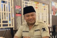 Kader Partai Gerindra mengenakan seragam partai lengkap dengan lambang Gerindra di lengan, saat menghadiri sebuah acara di Medan. (Foto: Istimewa)