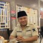 Kader Partai Gerindra mengenakan seragam partai lengkap dengan lambang Gerindra di lengan, saat menghadiri sebuah acara di Medan. (Foto: Istimewa)