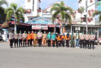 Polres Padangsidimpuan bersama TNI, BPBD, dan pihak kecamatan membagikan 3.000 masker gratis kepada masyarakat 
(Istimewa)