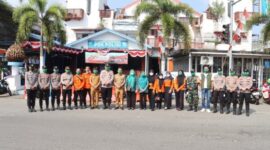 Polres Padangsidimpuan bersama TNI, BPBD, dan pihak kecamatan membagikan 3.000 masker gratis kepada masyarakat 
(Istimewa)